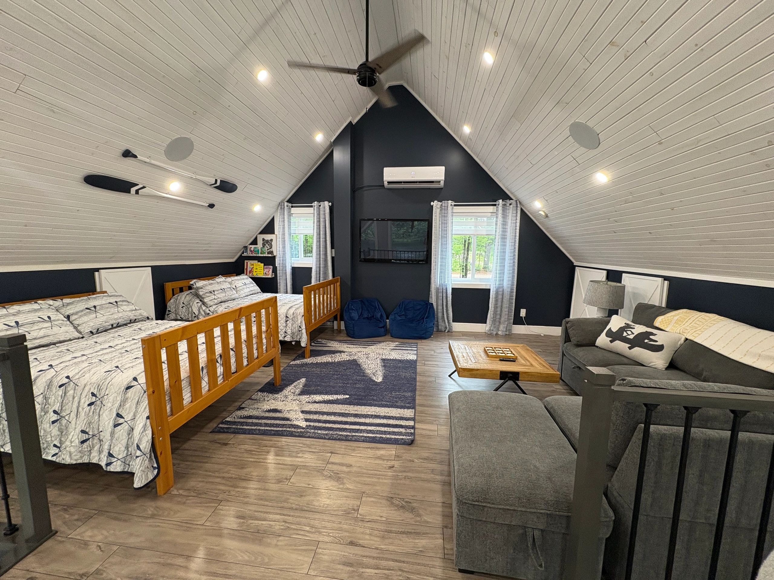 Loft with beds and seating