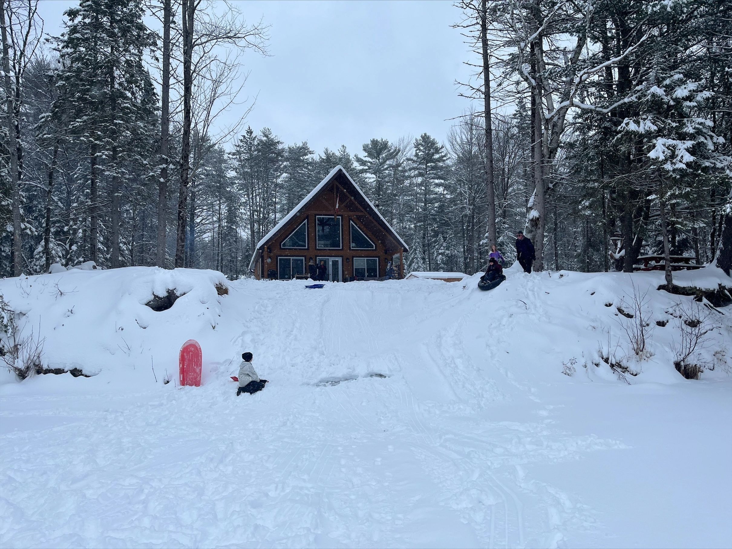 Lodge in winter with sledding